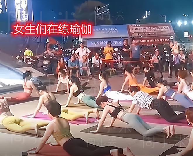 男人至死是少年！湖北女孩大街上练瑜伽遭一群男生围观(图1)